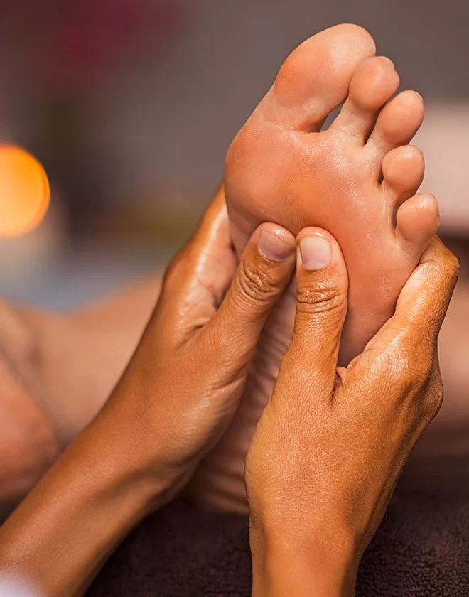 Photo d'un pied en reflexologie'